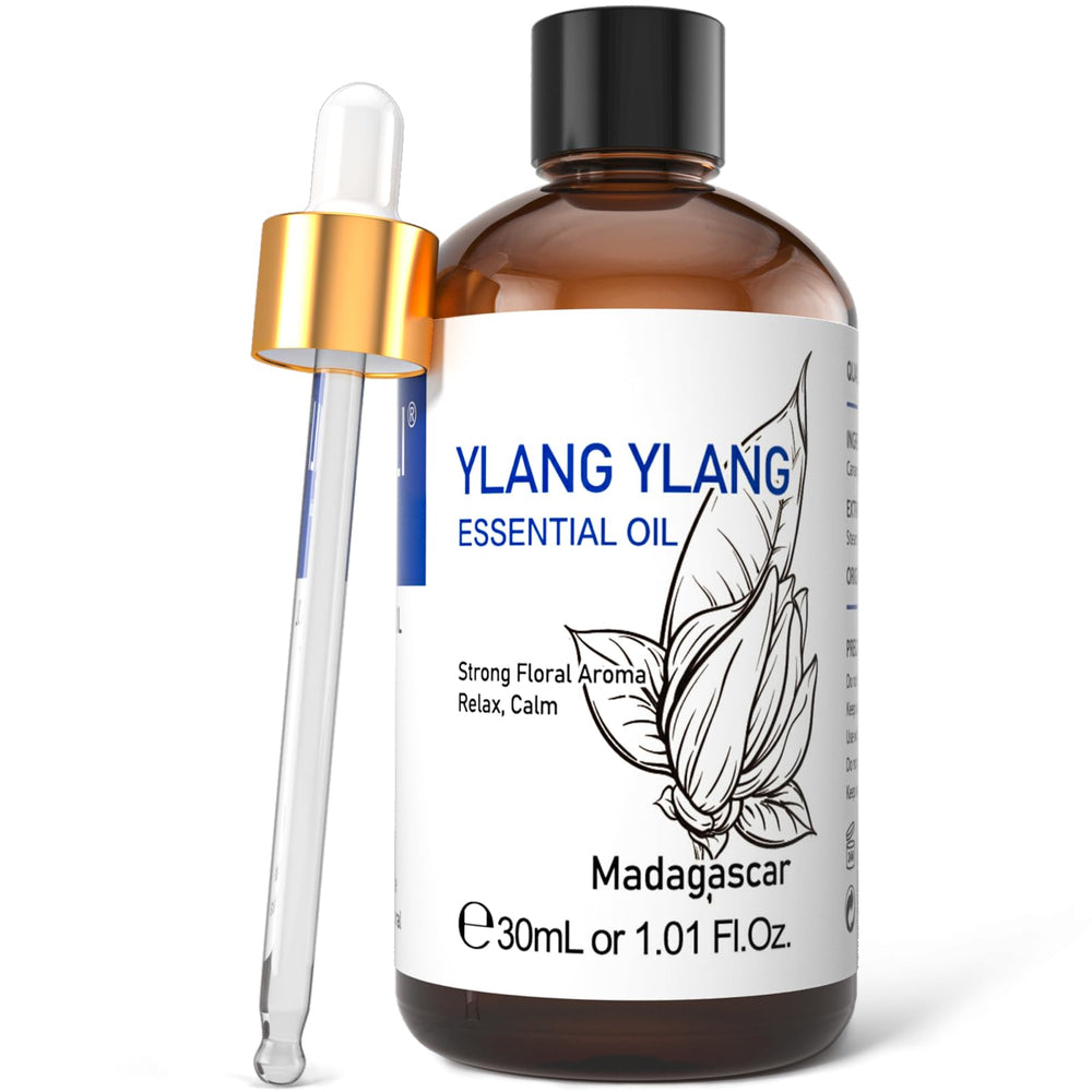 Ylang-Ylang essential oil in amber bottle