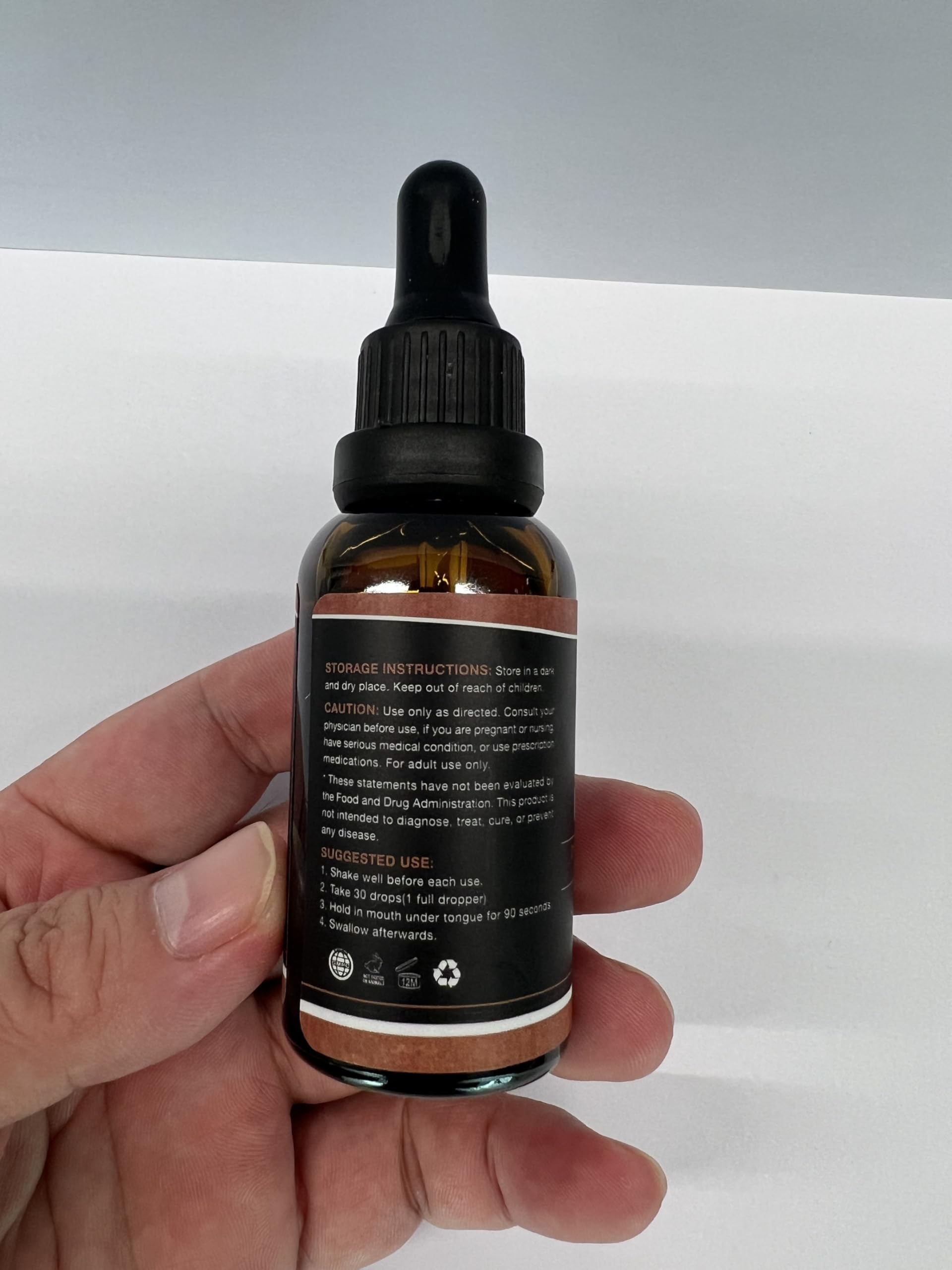 HMone Oil Drops bottle and packaging close-up