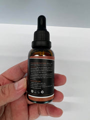 HMone Oil Drops bottle and packaging close-up
