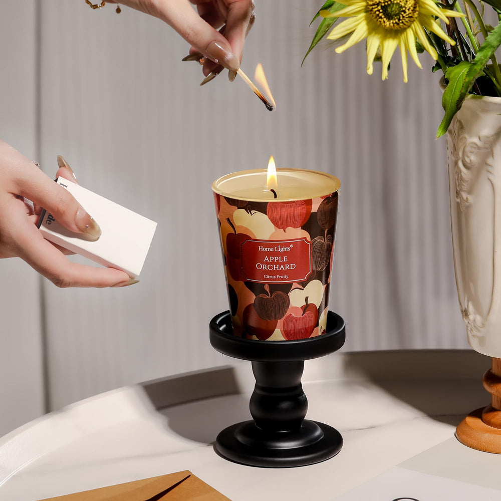 Candle displayed in a cozy living room setting