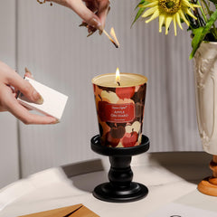 Candle displayed in a cozy living room setting