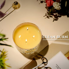 HomeLights candle in a reusable glass jar Peach Blossom Freesia on a table