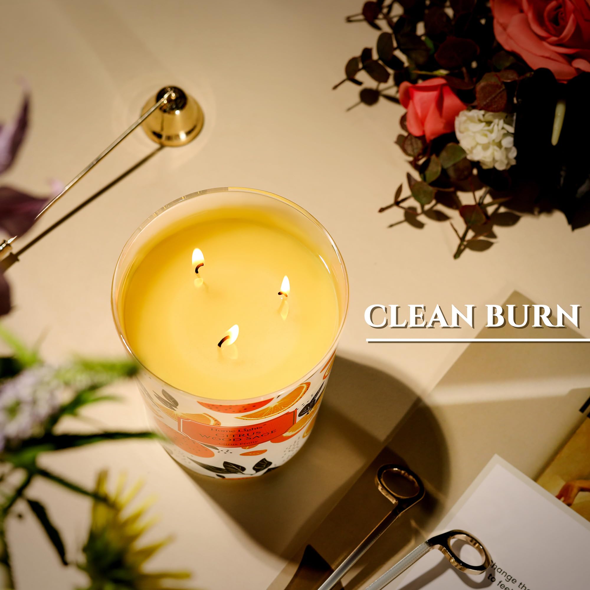 Decor setting with citrus wood sage candle on table