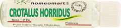 Close-up of homeopathic pellets in vial