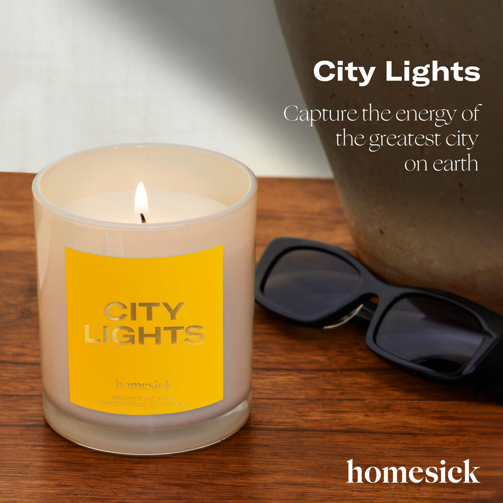 Amber and bergamot scent label on Homesick City Lights candle