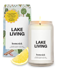 Close-up of the Homesick Lake Living candle label on a 13.75 oz jar