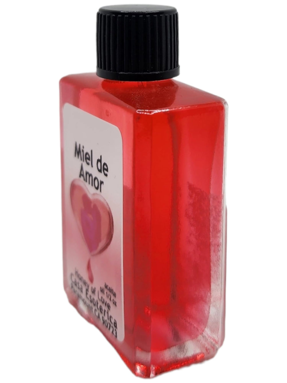 Amber bottle of Honey of Love Oil showing fragrance details