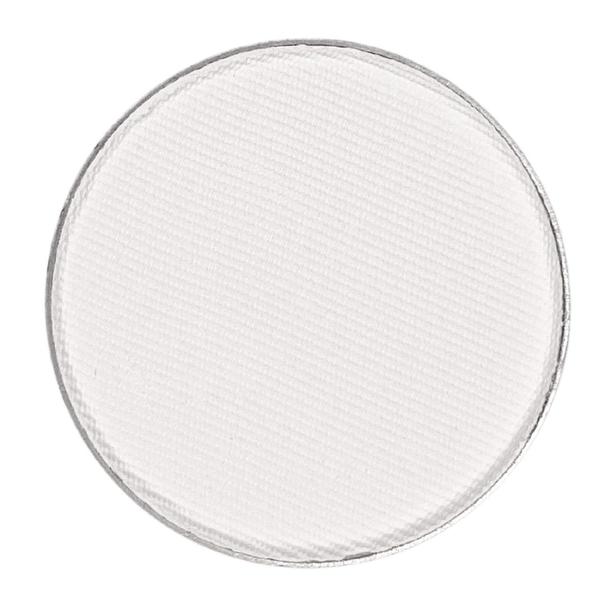 Honeybee Gardens Nirvana pressed shadow swatch shows matte white finish for a crisp daytime look.