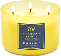 Honeysuckle Citrus Grapefruit 3-Wick Soy Candle in a soft yellow glass jar