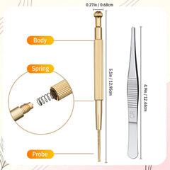 Close-up of ear beads, chart, and tools in box