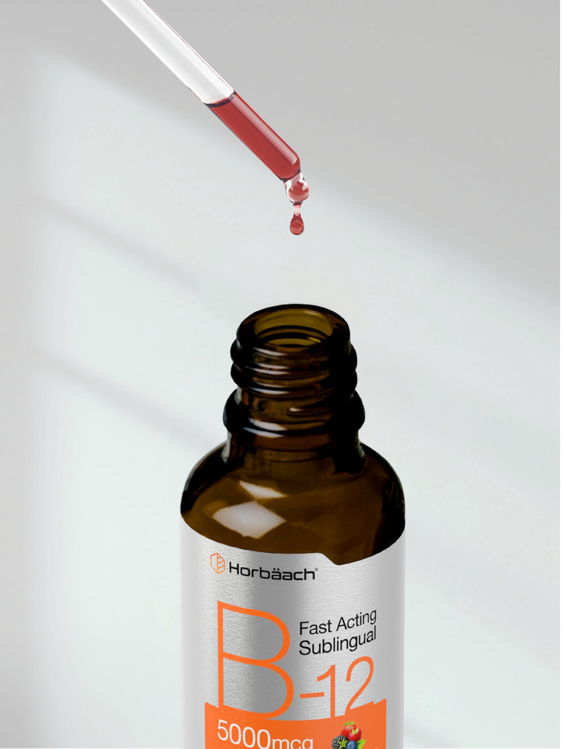 Bottle and dropper with berry flavor label