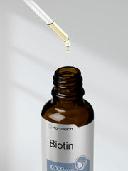 Berry-flavored Biotin Liquid Drops being used