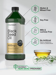 Cold-pressed extraction process imagery for black seed oil