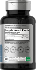 Zinc tablets on white background (100 mg chelated zinc)