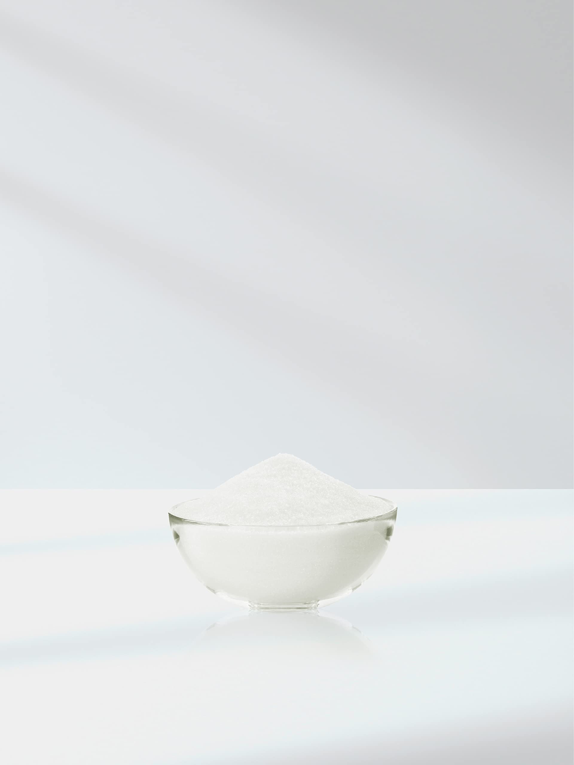 Horbaach Glycine Powder being mixed into a beverage