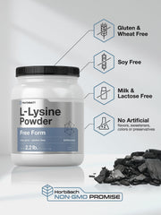 Scoop with L-Lysine powder on white surface