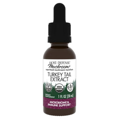 Host Defense Turkey Tail Extract bottle with dropper on white background