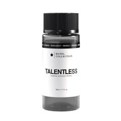 Hotel Collection Diffuser Oil Talentless Lemon Zest bottle enhances vibrant living room ambiance.