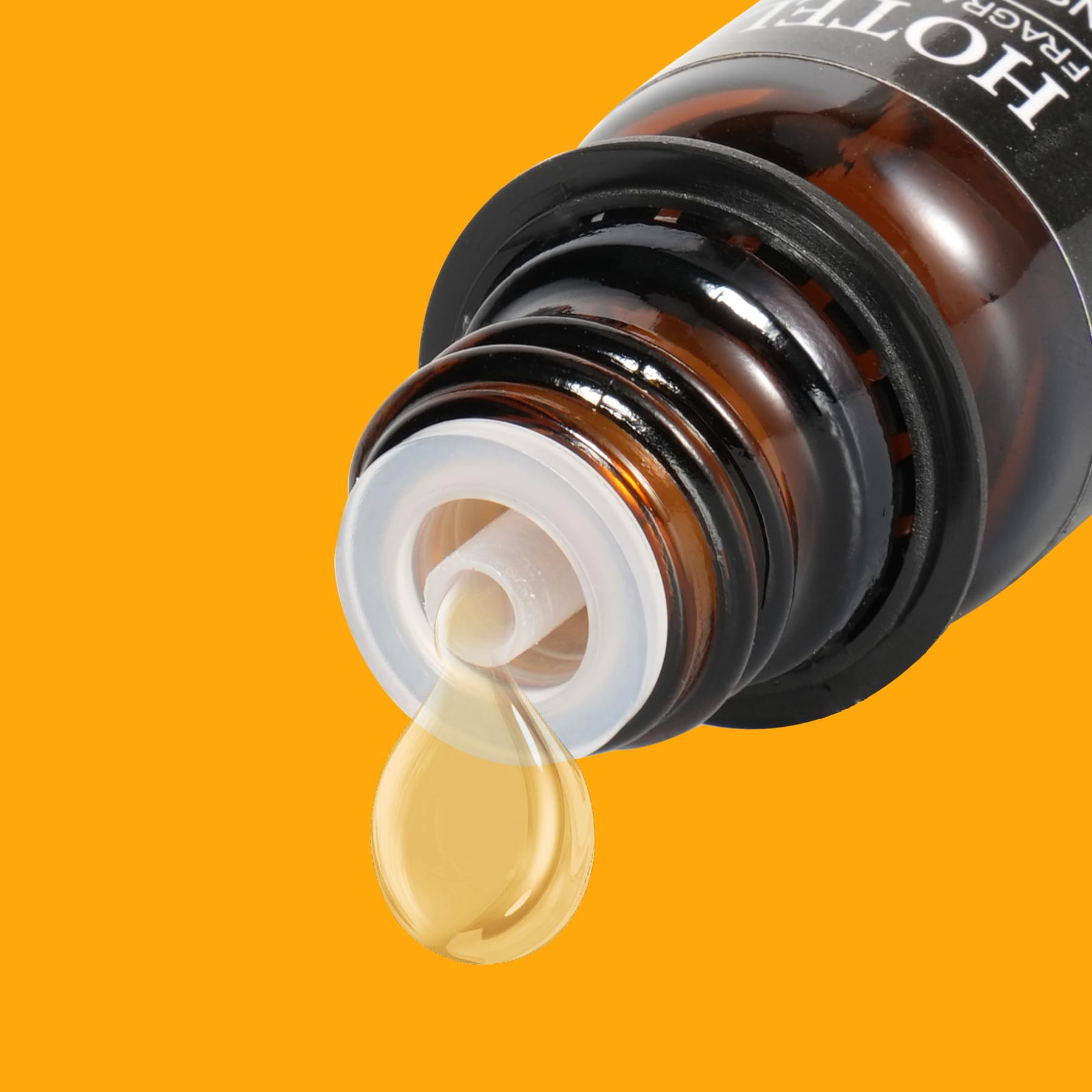 Close-up of premium diffuser oil bottle with drip-free dropper