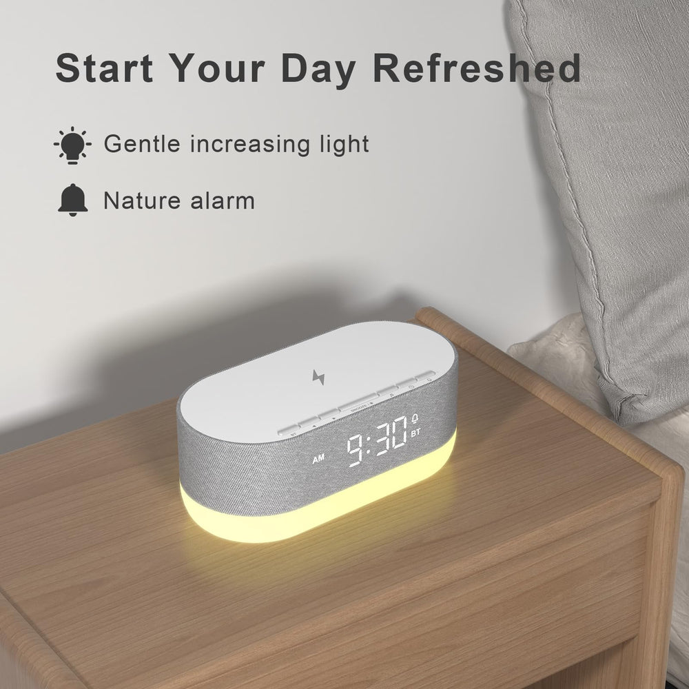 HOUSBAY sleep-wake routine display shows gentle wake with soft sunrise cue.