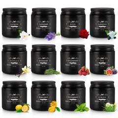 Close-up of Howemon candle jars in black glass with lids