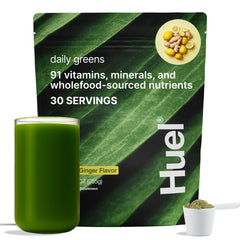 Front view of Huel Daily Greens Lemon and Ginger tub