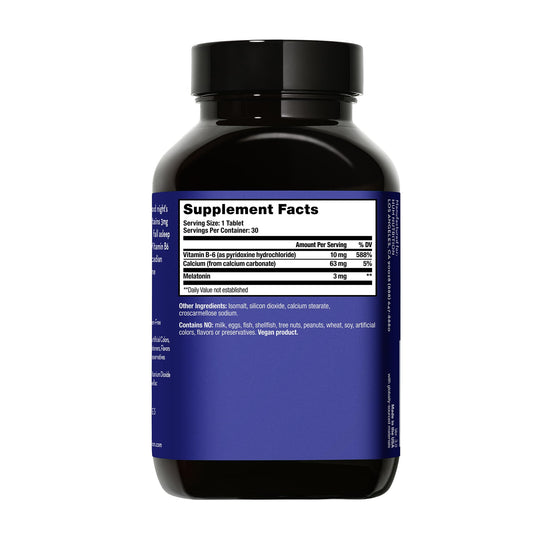 Close-up of HUM Beauty zzZz Melatonin Sleep Supplement bottle
