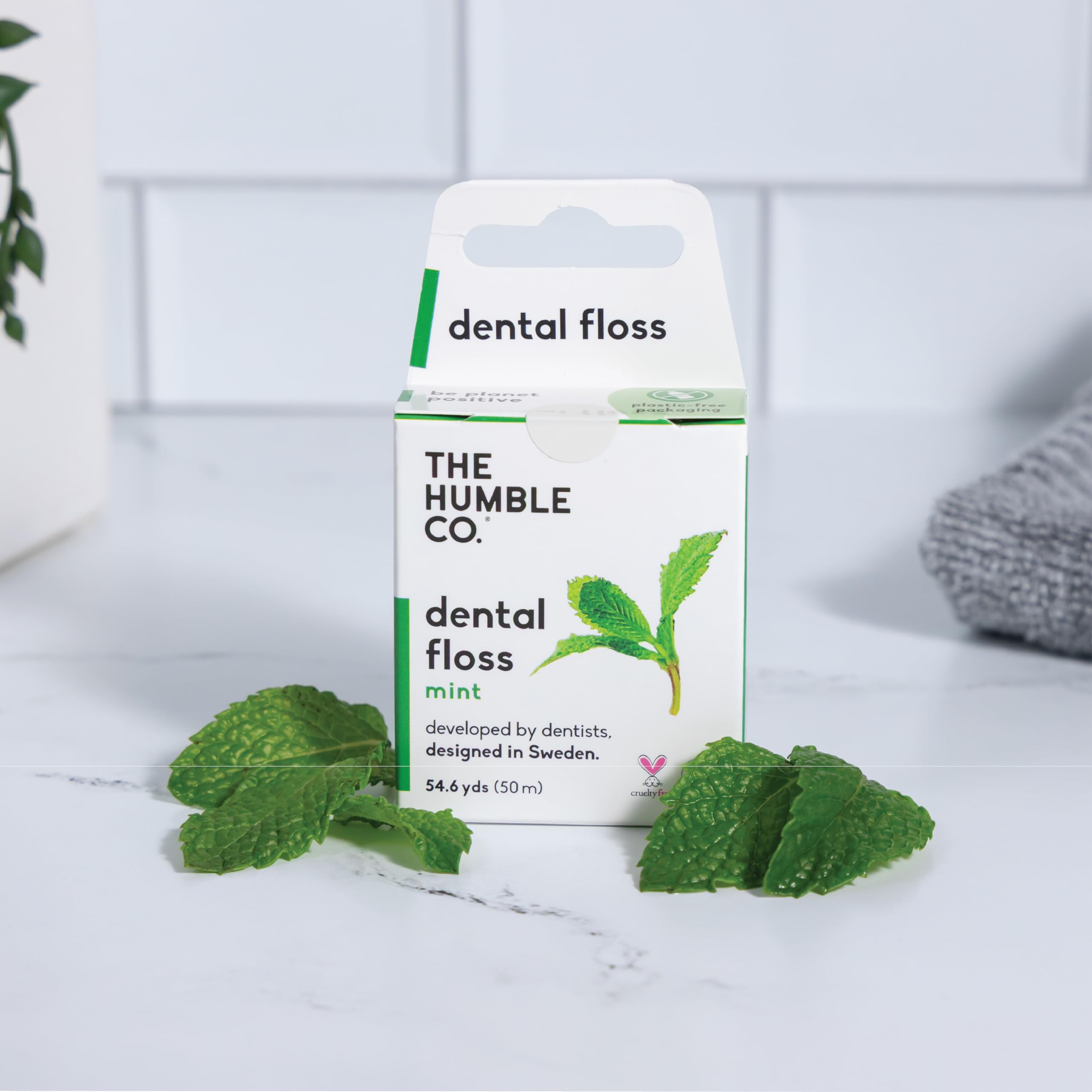 Packaging shows plastic-free design doubles as a floss dispenser