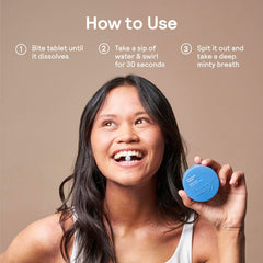 Tablets dissolving in water to create a refreshing mouthwash