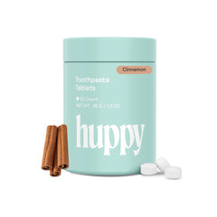 HUPPY Cinnamon-flavored toothpaste tablets in travel tin