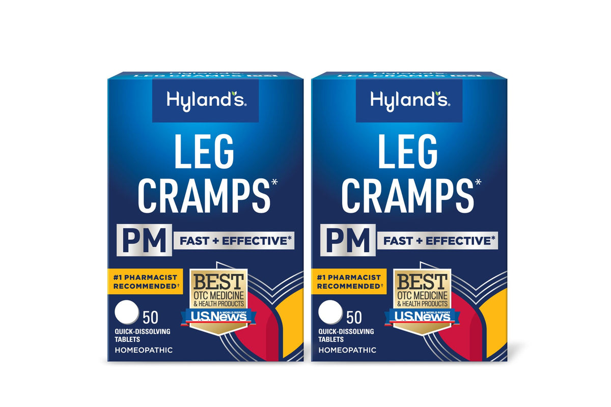 Hyland's Leg Cramps PM bottle on nightstand offering nighttime cramp relief