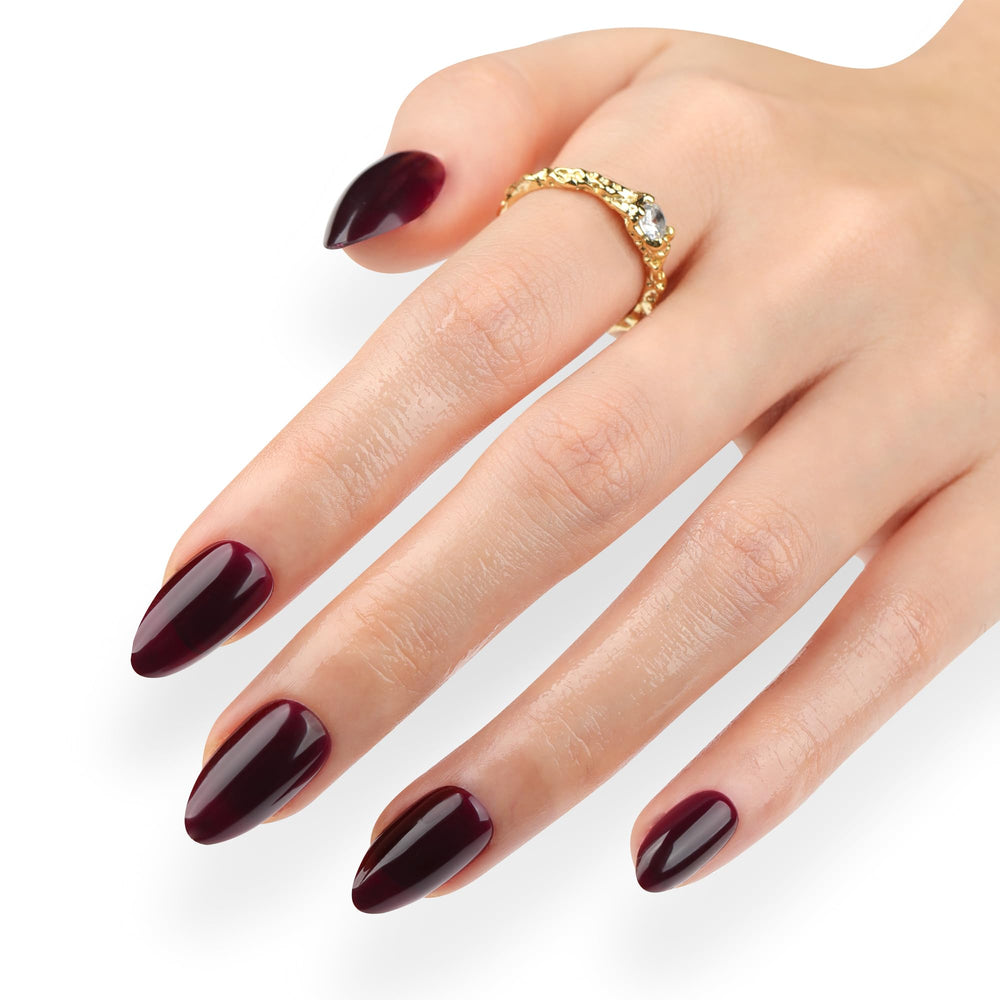Icebobo press-on nails almond dark red on hand for an instant salon-quality manicure