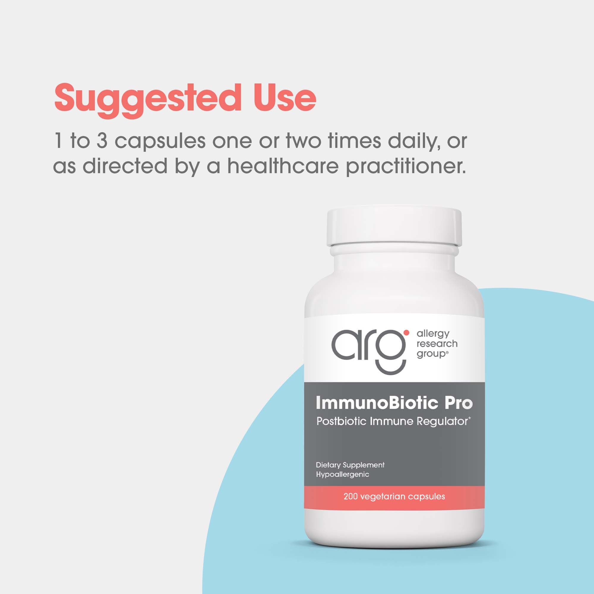 Three ImmunoBiotic Pro capsules on white background