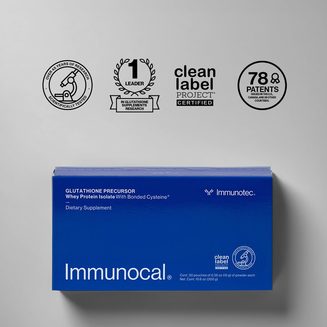 Immunocal bottle beside a steaming mug for energy and brain health.