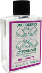 Bottle of INDIO Uncrossing Oil, 1/2 fl oz, for spiritual cleansing and ritual use