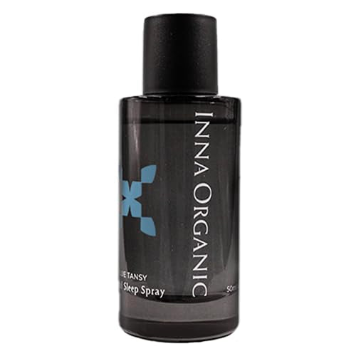 INNA ORGANIC Blue Tansy Sleep Spray bottle on nightstand promotes restful sleep.