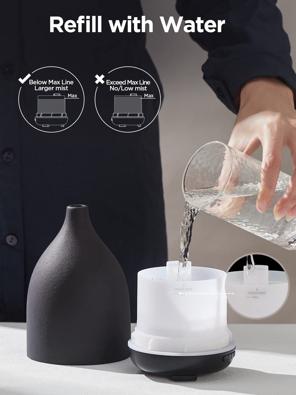 Diffuser shown with essential oil bottle