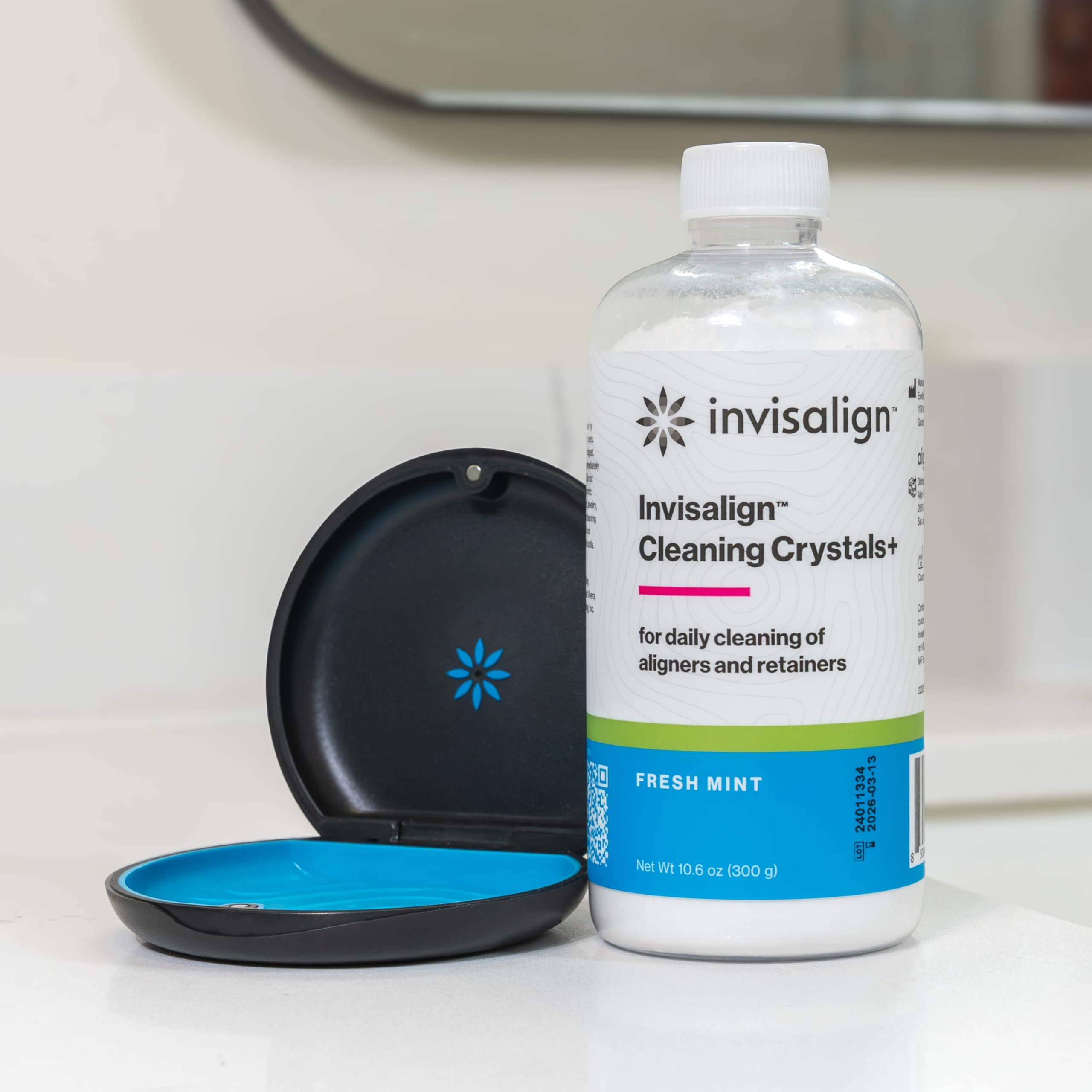 Aligners soaking in Cleaning Crystals+ solution