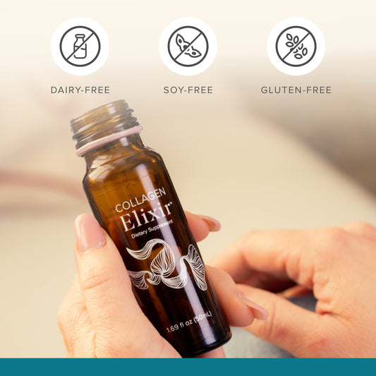 Close-up of Isagenix Collagen Elixir liquid in glass with bottle