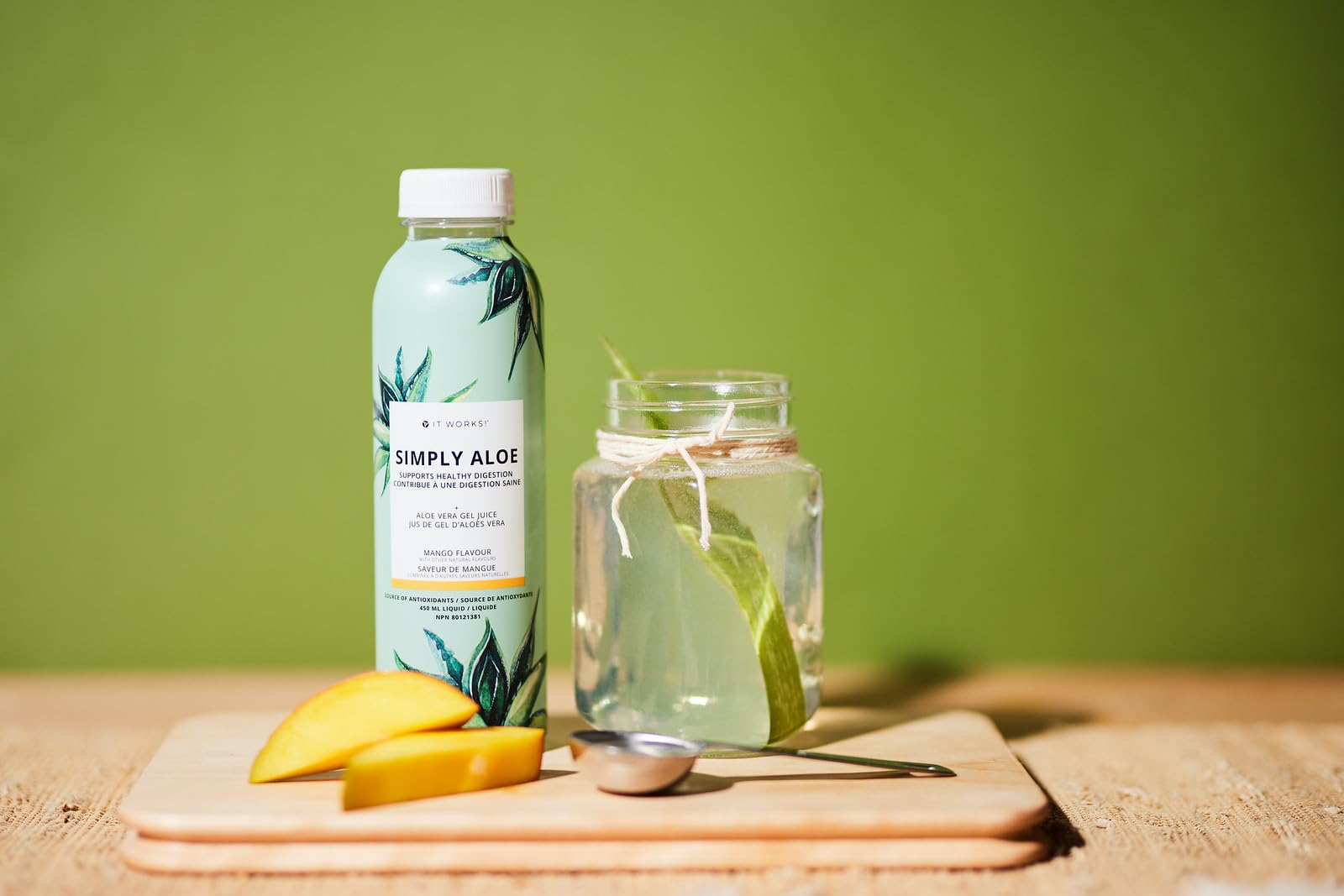 Graphic illustrating digestion and wellness benefits of Aloe Mango juice