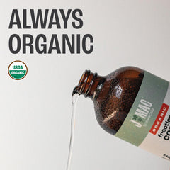 4 oz glass bottle with coconut oil label in natural light