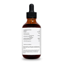 Lifestyle scene with turmeric drops emphasizing vegan and non-GMO