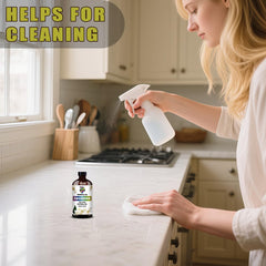 Fresh jasmine flowers beside an essential oil bottle