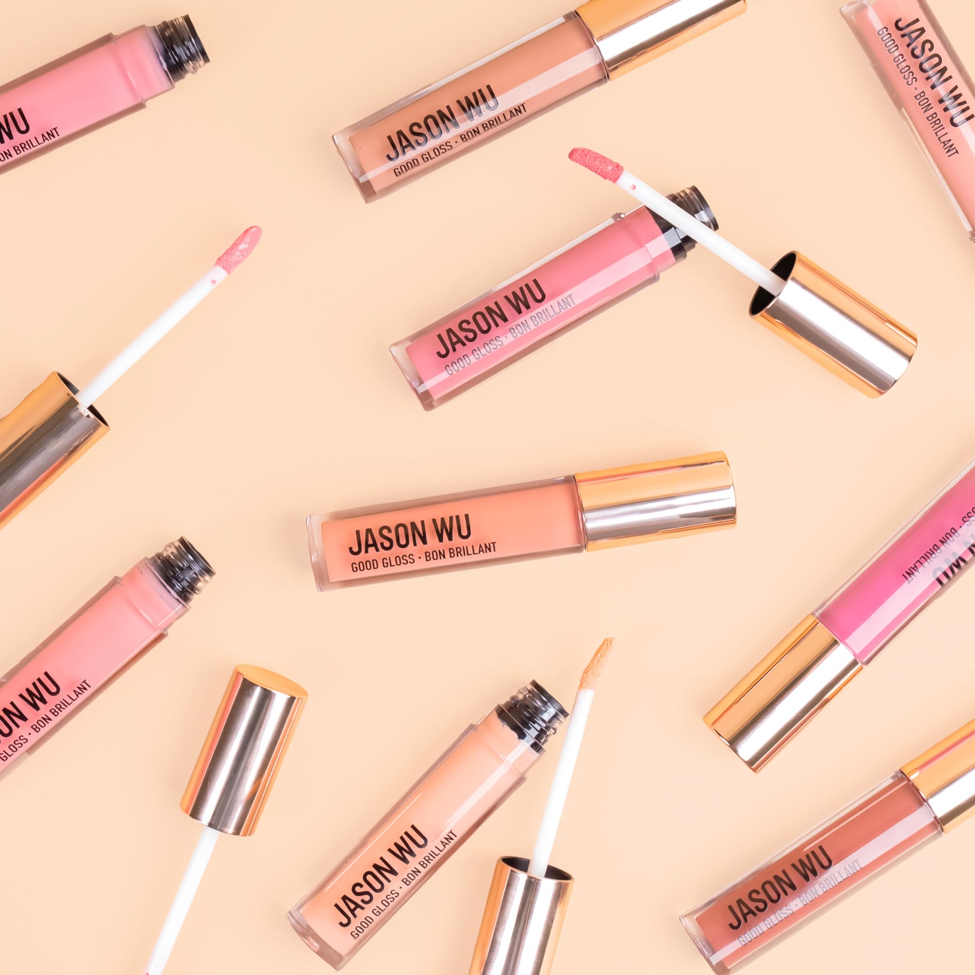 Lip glow shot using Jason Wu Good Gloss Almond Latte reveals medium pigment shine.