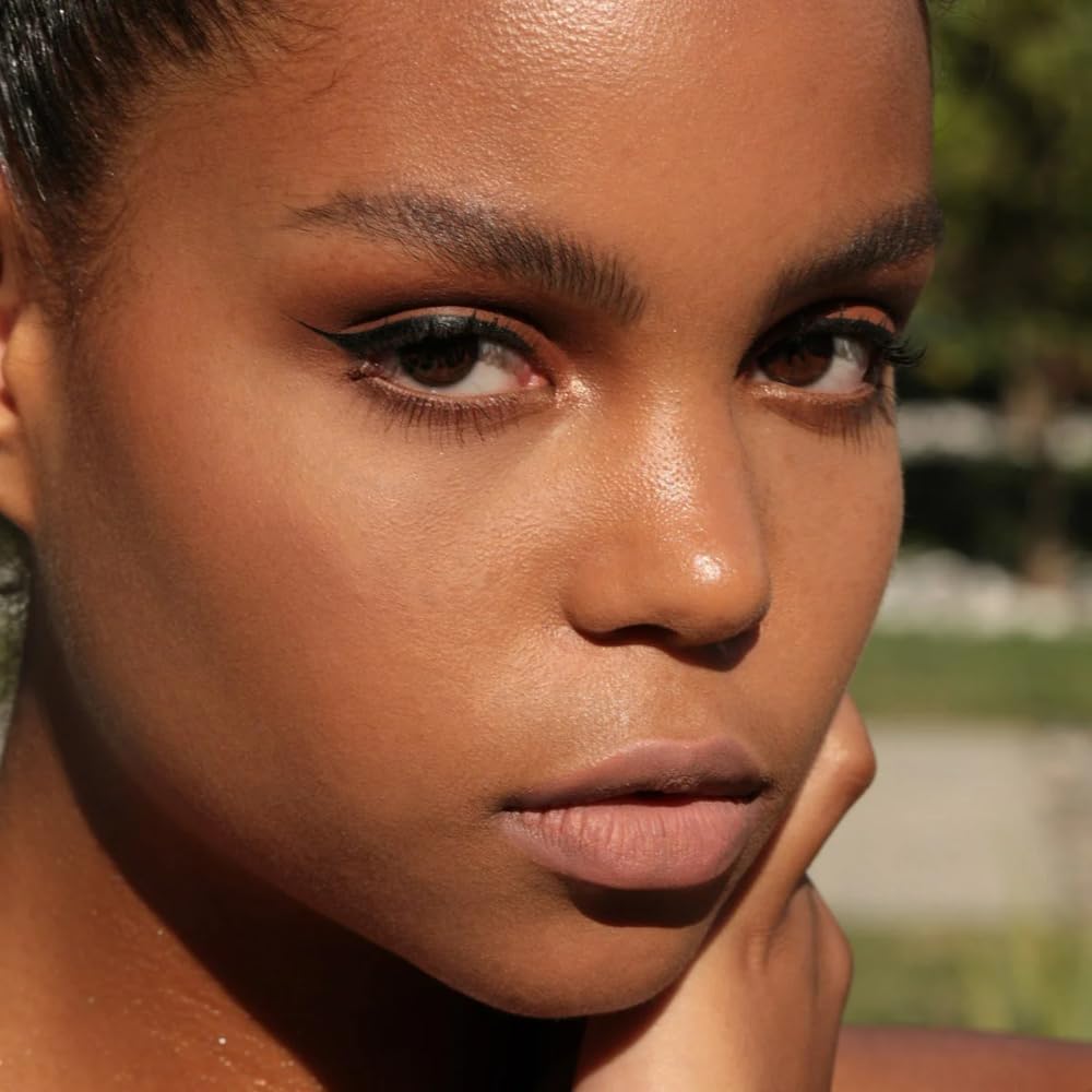 Jason Wu Honey Fluff Dolled Up lip swatch close-up; nourishing oils.