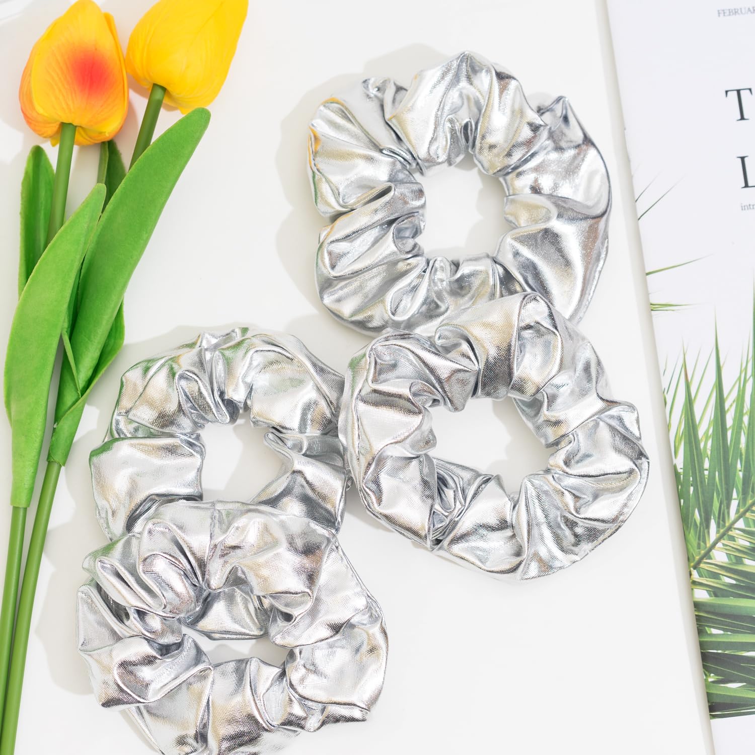Jeffan mermaid-inspired silver scrunchie highlighting shiny style for routines
