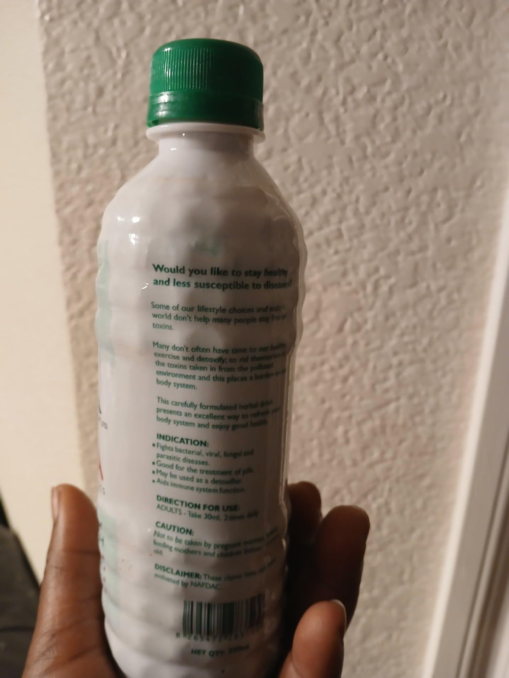 Jinja Herbal Extract bottle on white background