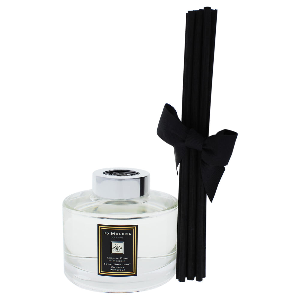 Close-up of English Pear and Freesia diffuser reeds and label
