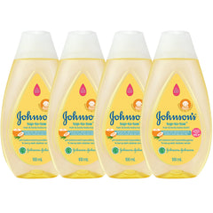 Four 100ml travel-size Johnson's Top-to-Toe Baby Wash and Shampoo bottles