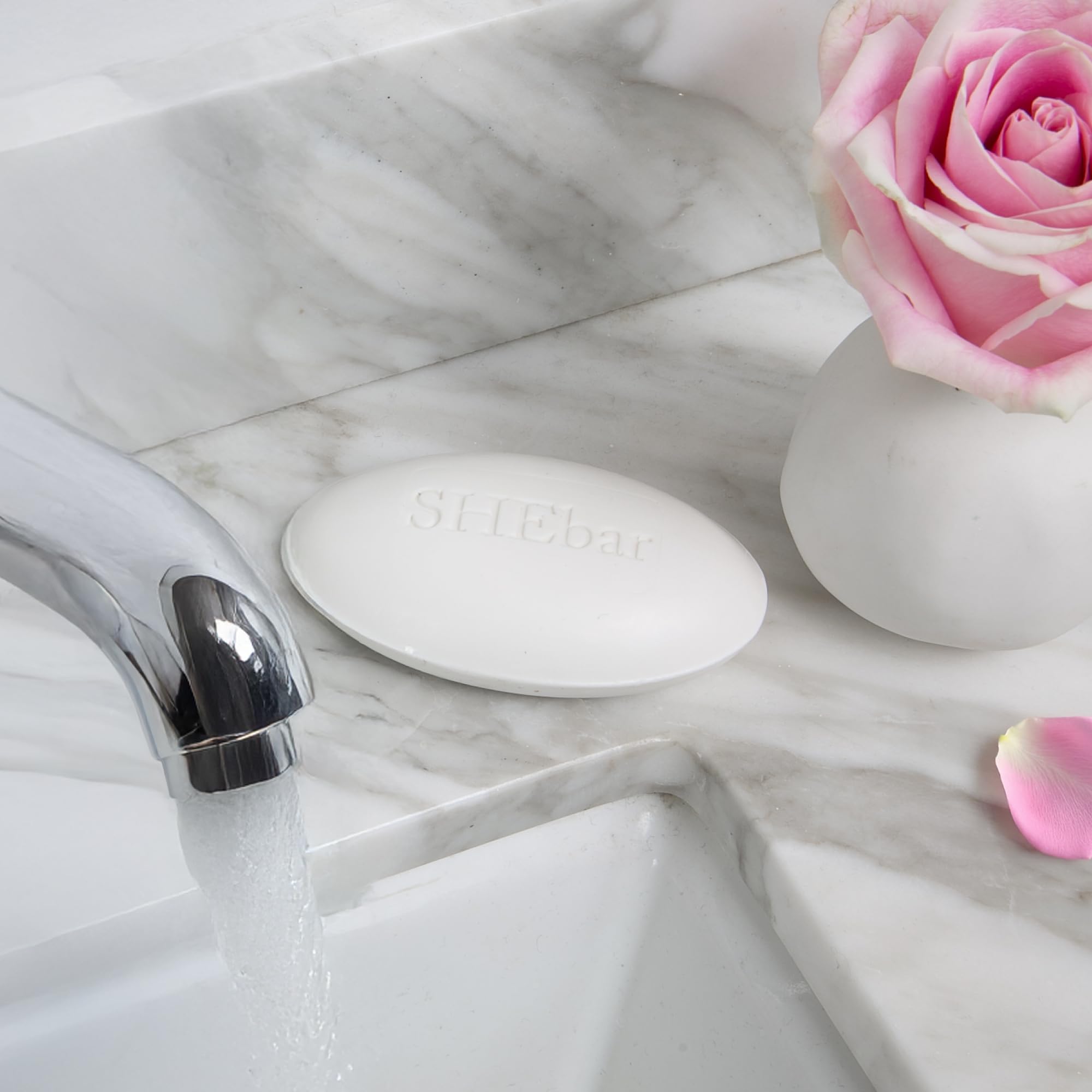 Joylux SHEbar light mandarin scent enhances routine cleansing.